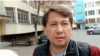 Активист Асет Абишев на кадре из видео
