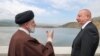Iranian President Ebrahim Raisi and Azerbaijan's President Ilham Aliyev visit a dam on the Azerbaijan-Iran border, May 19, 2024.
