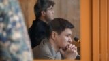 Бахытжан Байжанов (на переднем плане) и Куандык Бишимбаев в суде Астаны в 2024 году