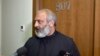 Armenia- Archbishop Bagrat Galstanian talks to reporters at a hotel in Yerevan, May 25, 2024.