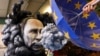 Skulptura prikazuje ruskog predsednika Vladimira Putina na karnevalu u Majncu, Nemačka, u februaru 2023.