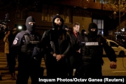 Andrew Tate i njegov brat Tristan privedeni su u decembru 2022. u Bukureštu zbog optužbi za silovanje i trgovinu ljudima