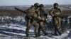 Українські військові поблизу міста Соледару на Донеччині, 11 січня 2023 року