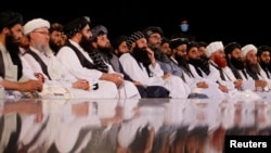 یوشمېر طالب مشران په یوه غونډه کې د ګډون پر مهال - پخوانی انځور. 