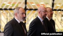 Belgium - European Council President Charles Michel, Armenian Prime Minister Nikol Pashinian and Azerbaijani President Ilham Aliyev begin a trilateral meeting in Brussels, April 6, 2022.