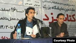 Hossein Jannati (left) recited a poem in which he said Iranians were caught in "a night" with no escape route between "one tyrant and another." 