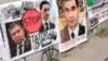 Piketçileriň plakatlary. Warşawa, 27-nji awgust, 2022. 