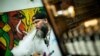 A vape shop worker consumes electronic smoking products in a local store in Jersey City, New Jersey, U.S., September 12, 2019. REUTERS/Eduardo Munoz - RC1B475FC950