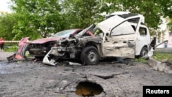Russia - A view shows cars damaged by shelling, what local authorities called a Ukrainian military strike on Belgorod, May 14, 2024.
