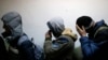 Migranti sa Kosova u policijskoj stanici u Subotici