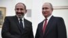 Никол Пашинян (слева) и Владимир Путин