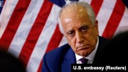 The U.S. special envoy for peace in Afghanistan, Zalmay Khalilzad, talks with local reporters at the U.S. Embassy in Kabul in November.
