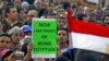 Protestçiler parlamentiň gabawyny hem-de Tahrir meýdançasyndaky lagerlerini berkitdiler