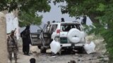 Pakistani security officials examine the site of a powerful explosion in Mastung district, east of provincial capital Quetta, in the southwestern province of Balochistan in May.