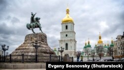 UKRAINE -- View on Hetman Bohdan Khmelnytsky monument and Saint Sophia Cathedral on Sofia square in Kyiv, 14Mar2016