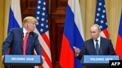 ABŞ prezidenti Donald Tramp Russiýanyň prezidenti Wladimir Putin bilen metbugat ýygnagynda çykyş edýär. Helsinki, 16-njy iýul, 2018.