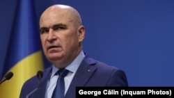 Premierul Ilie Bolojan a intrat în vizorul magistraților după ce a propus creșterea vârstei de pensionare la 65 de ani și reducerea cuantumului pensiei la 70% din valoarea ultimului salariu net. 
