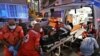 LEBANON -- Medics shift an injured person from Najjar Hospital to another hospital in Al-Hamra area in Beirut after Port explosion, in Beirut, August 4, 2020. 