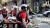 UKRAINE -- Rescuing a wounded person as a result of a Russian attack on Kyiv. June 17, 2025