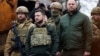 Președintele Ucrainei, Volodimir Zelenski la 4 aprilie 2022, în orașul Bucea unde au fost uciși de soldații ruși cel puțin 300 de civili. Câteva zeci de cadavre au fost lăsate pe străzi. Unii oameni au fost împușcați, alții au fosct călcați cu tancul în propriile mașini. 