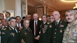 Azerbaijan -- Turkish President Recep Tayyip Erdogan, center, poses for photos with Azeri and Turkish army commanders during a summit of Turkic states in Baku, October 15, 2019.