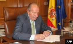Кароль Хуан Карлас зракаецца трону, 2014 год
