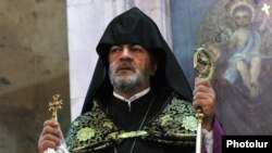 Armenia -- Archbishop Navasard Kchoyan leads a ceremony in St. Sargis Church, Yerevan, September 2, 2014.