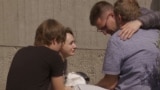 UKRAINE - POLTAVA - GRIEVING RELATIVES GATHERED OUTSIDE A MORGUE