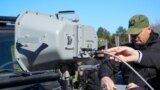 Serbia -- Minister of the Interior Ivica Dacic demonstrates the use of LRAD-450XL and LRAD-100X weapons, Belgrade, March 19, 2025