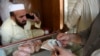 د پېښور په یو بازار کې د صرافۍ دوکان ـ پخوانی انځور.