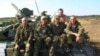 Вересень 2014 рік, підступи до Дебальцева з боку Вуглегірська. З ліва на право: волонтер, боєць 34-го батальйону Олег Копил; старшина 17-го батальйону Сергій Лещик, танкіст 17-ї танкової бригади (ім`я не відоме), боєць17 ОМПБ Андрій Бойко, позаду волонтер Віталій Журавльов