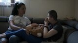 Bobana Miljevic from Banja Luka with her son Ognjen, who suffers from a rare genetic disorder. She takes care of him 24 hours a day because he cannot see, speak, or move independently.