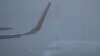 Avion Aeroflota u magli moskovskog aerodroma Šeremetjevo - fotografija iz marta 2020.