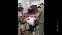 Окуя тартылган видеодон алынган скриншот. 