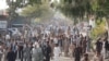 کورمه کې زرګونو کسانو د لارو بندېدو او د ناامنیو د پېښو ضد احتجاجي لاریون کړی