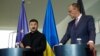 Украинският президент Володимир Зеленски (вляво) и германският канцлер Фридрих Мерц дават съвместна пресконференция в Берлин, 28 май 2025 г.