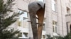 A statue symbolizing the national currency, the dram, outside the Central Bank building in Yerevan, Armenia.