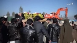 د جنازې پر مهال د وژل شوي کسانو مړي خاورو ته وسپارل شوه