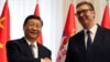 Chinese President Xi Jinping shakes hands with Serbian President Aleksandar Vucic at the Palace of Serbia during a meeting as part of the Chinese president's two-day state visit in Belgrade, Serbia, May 8, 2024.