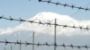 Armenia -- Barbed wire, pictured against the backdrop of Mount Ararat, marks Armenia's closed border with Turkey